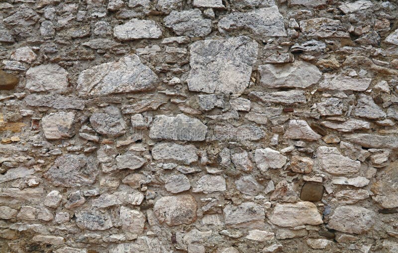Παλαιός βαλμένος σε στρώσεις πέτρα τοίχος του φρουρίου ή του κάστρου στοκ φωτογραφία με δικαίωμα ελεύθερης χρήσης Παλαιός βαλμένος σε στρώσεις πέτρα τοίχος του φρουρίου ή του κάστρου στοκ φωτογραφία με δικαίωμα ελεύθερης χρήσης