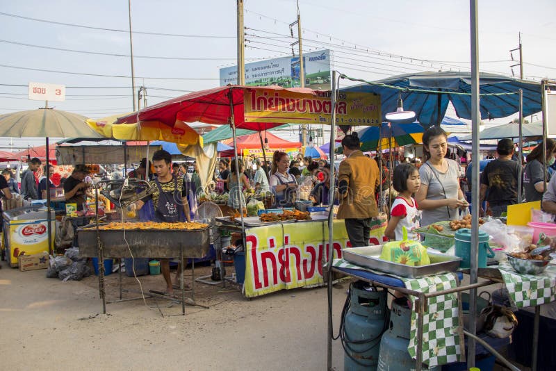 RATCHABURI THAILAND - 6 JANUARY 2018 : People`s way of life in province with shopping and variety of street food at flea market is named Bird Klong Thom Ratchaburi. RATCHABURI THAILAND - 6 JANUARY 2018 : People`s way of life in province with shopping and variety of street food at flea market is named Bird Klong Thom Ratchaburi.