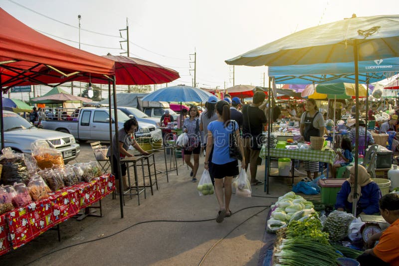 RATCHABURI THAILAND - 6 JANUARY 2018 : People`s way of life in province with shopping and variety of street food at flea market is named Bird Klong Thom Ratchaburi. RATCHABURI THAILAND - 6 JANUARY 2018 : People`s way of life in province with shopping and variety of street food at flea market is named Bird Klong Thom Ratchaburi.