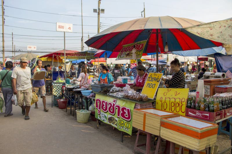 RATCHABURI, THAILAND - 6 JANUARY 2018 : People`s way of life in province with shopping and variety of street food at flea market is named Bird Klong Thom Ratchaburi. RATCHABURI, THAILAND - 6 JANUARY 2018 : People`s way of life in province with shopping and variety of street food at flea market is named Bird Klong Thom Ratchaburi.