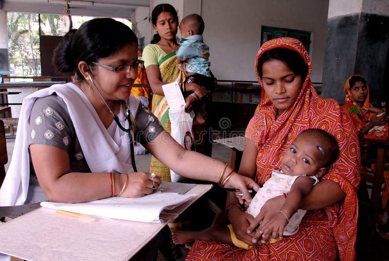 May 03, 2011-ThakurPukur, Kolkata, West Bengal, India -Poor mother & child in the clinic center of Kolkata. Half of India's children under the age of five are malnourished. Being undernourished affects not only the physical but also the mental development of the child. May 03, 2011-ThakurPukur, Kolkata, West Bengal, India -Poor mother & child in the clinic center of Kolkata. Half of India's children under the age of five are malnourished. Being undernourished affects not only the physical but also the mental development of the child