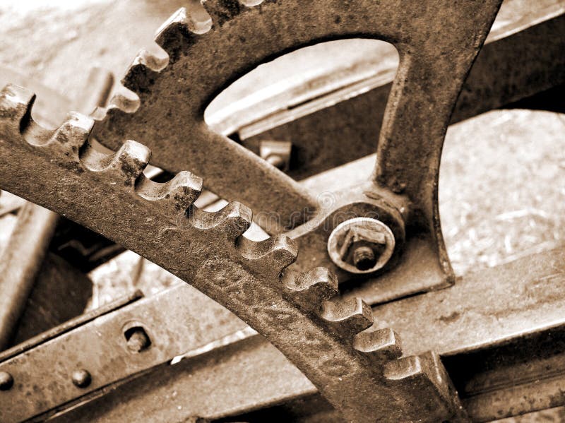 Gears and levers on old farm plow. Gears and levers on old farm plow