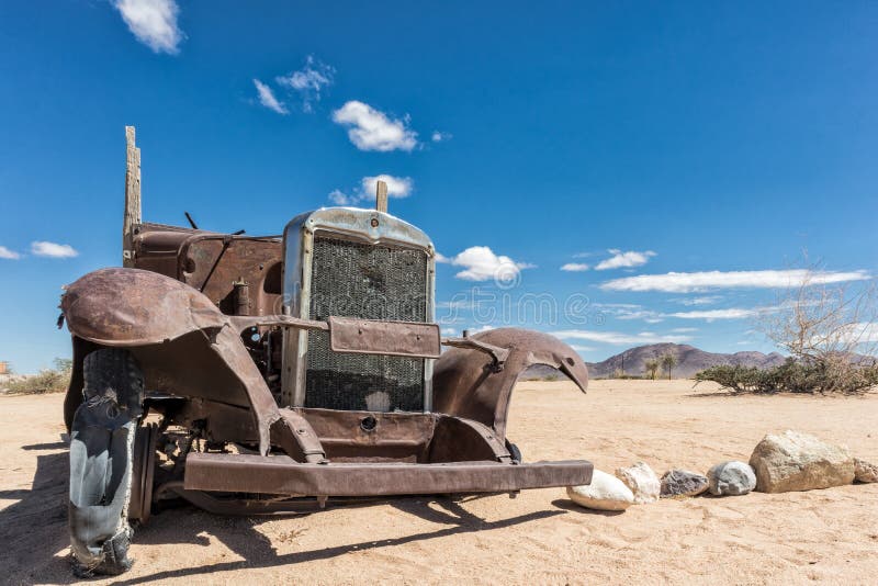 Old and abandoned car in the desert of Namibia, spot known as solitaire. Africa. Old and abandoned car in the desert of Namibia, spot known as solitaire. Africa