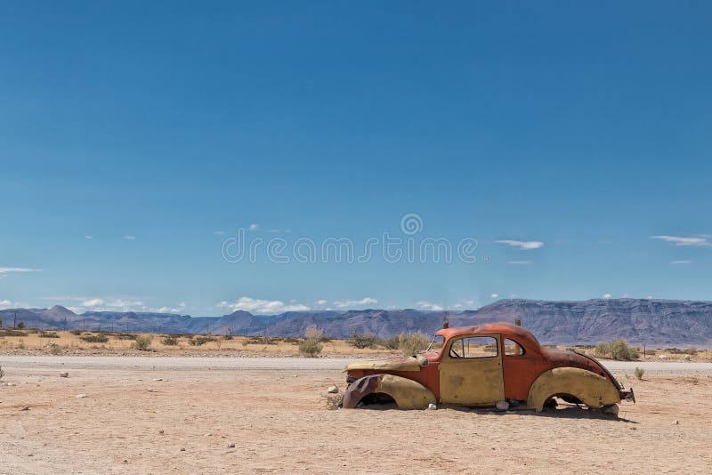 Old and abandoned car in the desert of Namibia, spot known as solitaire. Africa. Old and abandoned car in the desert of Namibia, spot known as solitaire. Africa