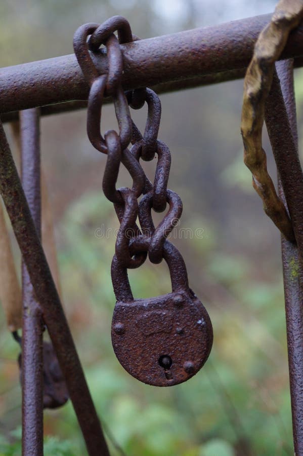 old rusty, forgotten and soaked padlock. old rusty, forgotten and soaked padlock