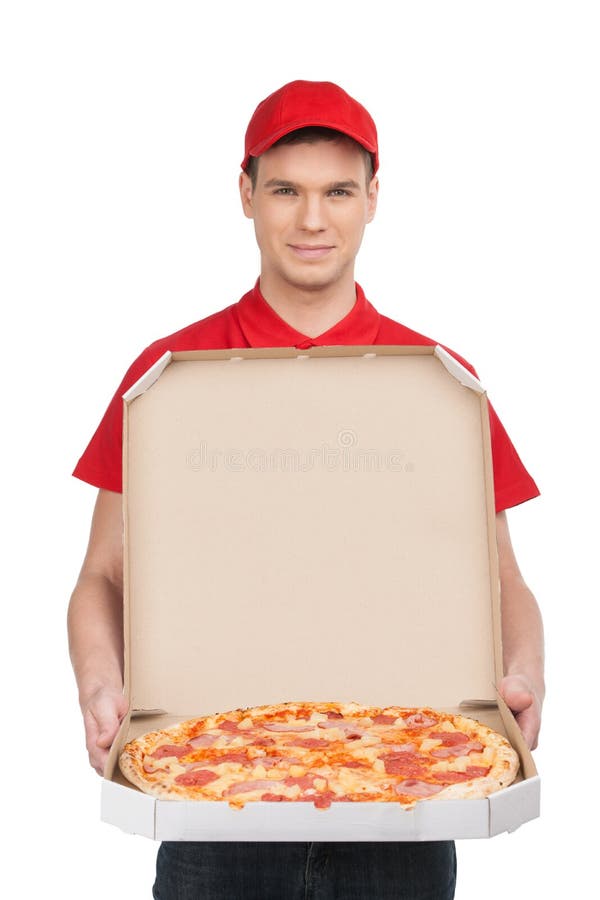 Παράδοση πιτσών. Εύθυμη νέα deliveryman εκμετάλλευση ένα κιβώτιο W πιτσών στοκ εικόνες Παράδοση πιτσών. Εύθυμη νέα deliveryman εκμετάλλευση ένα κιβώτιο W πιτσών στοκ εικόνες