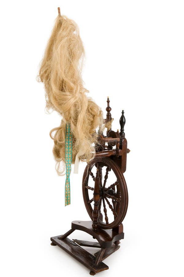 Antique spinning-wheel before white background. Antique spinning-wheel before white background