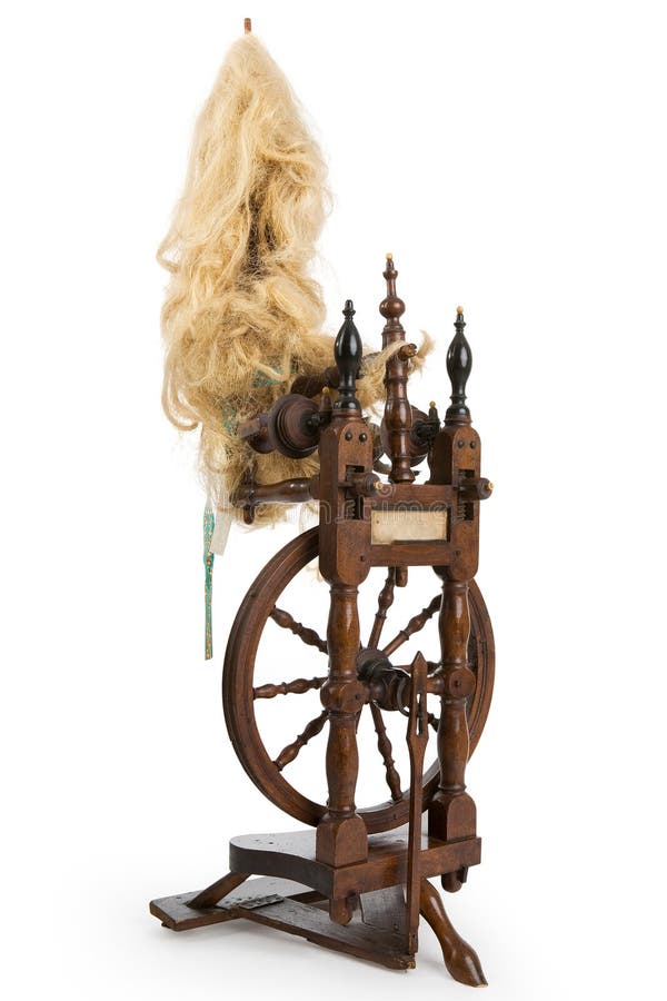 Antique spinning-wheel before white background. Antique spinning-wheel before white background