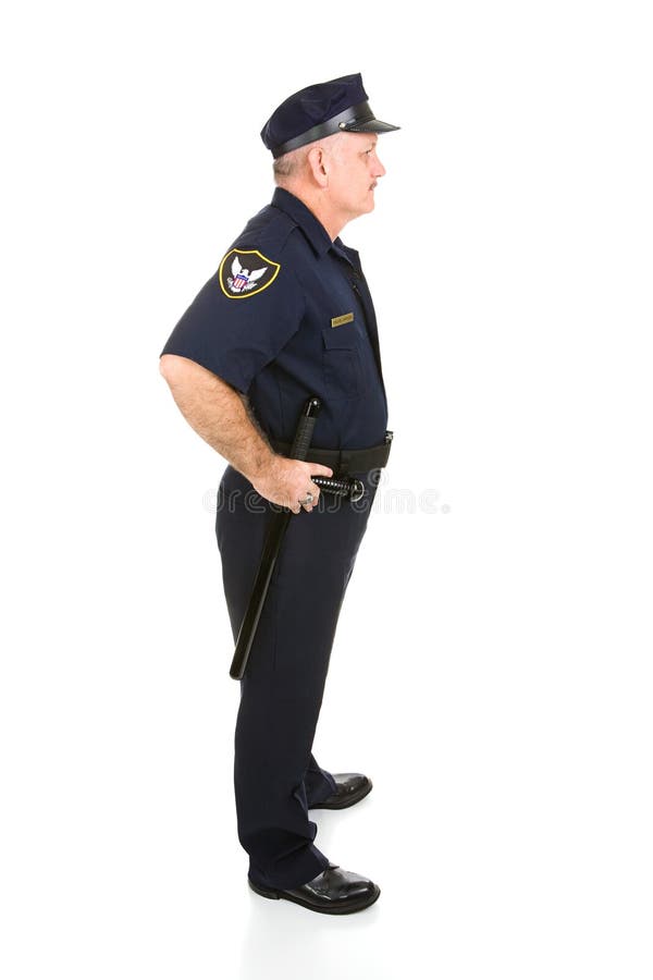 Handsome mature police officer in profile. Full body isolated on white. Handsome mature police officer in profile. Full body isolated on white.