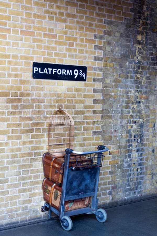 concept of train platform 9 1/4 reference to famous movie saga, luggage on train platform. concept of train platform 9 1/4 reference to famous movie saga, luggage on train platform