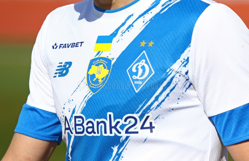 Uzhhorod, Ukraine - March 12, 2023: Close-up front side of Dynamo Kyiv player t-shirt (jersey) with team and sponsors logos seen during the VBET Ukrainian Premier League game SC Dnipro-1 v Dynamo Kyiv. Uzhhorod, Ukraine - March 12, 2023: Close-up front side of Dynamo Kyiv player t-shirt (jersey) with team and sponsors logos seen during the VBET Ukrainian Premier League game SC Dnipro-1 v Dynamo Kyiv