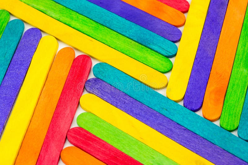 Abstract multi color of wooden ice cream sticks align in pattern as texture and background. Abstract multi color of wooden ice cream sticks align in pattern as texture and background