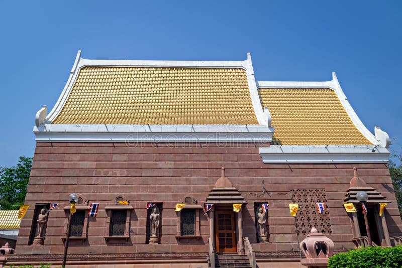 Colorful Wat Thai temple with clear blue sky background in Sarnath, Uttar Pradesh, India. Colorful Wat Thai temple with clear blue sky background in Sarnath, Uttar Pradesh, India.