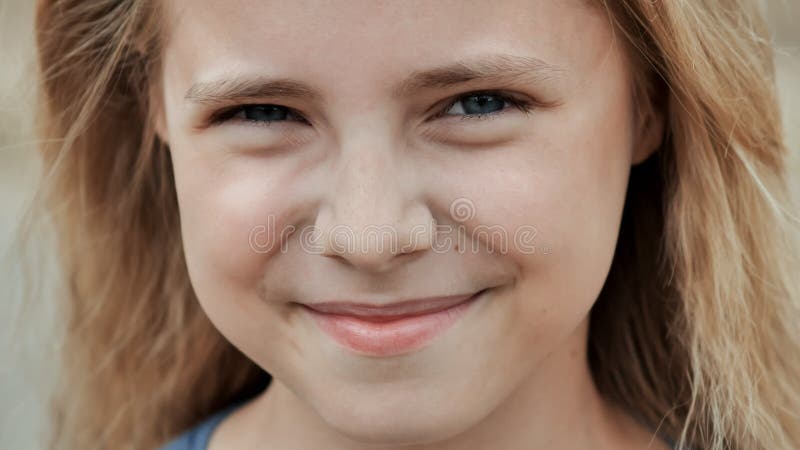 Portrait of a young smiling 11 year old girl. Face close up. Portrait of a young smiling 11 year old girl. Face close up