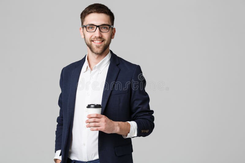 Πορτρέτο ενός όμορφου επιχειρηματία eyeglasses με ένα φλιτζάνι του καφέ στοκ φωτογραφία με δικαίωμα ελεύθερης χρήσης Πορτρέτο ενός όμορφου επιχειρηματία eyeglasses με ένα φλιτζάνι του καφέ στοκ φωτογραφία με δικαίωμα ελεύθερης χρήσης