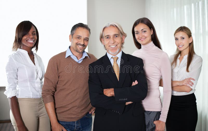 Portrait of successful team of business professionals standing together. Portrait of successful team of business professionals standing together