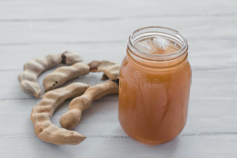 Tamarindo drink, tamarind water. sweet juice in mexico agua de tamarindo. Tamarindo drink, tamarind water. sweet juice in mexico agua de tamarindo