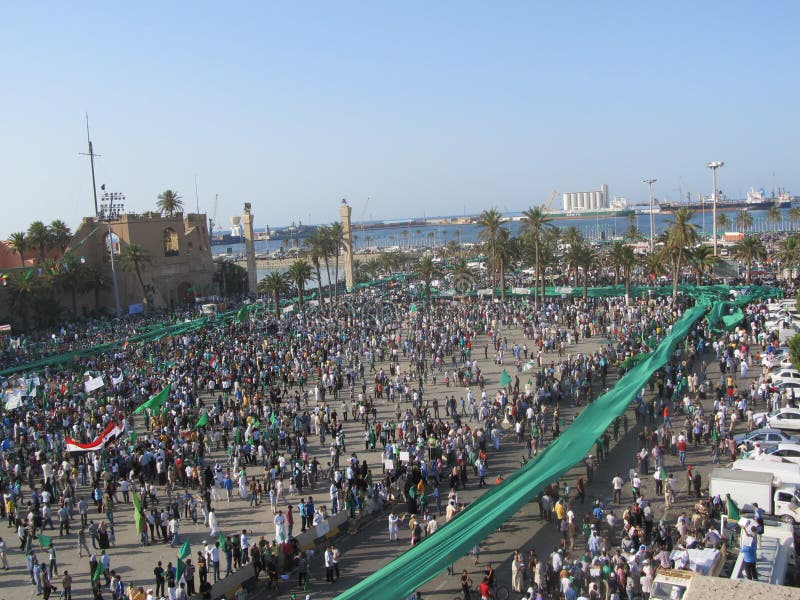 TRIPOLI, LIBYA - Jul 01, 2011: Libyan demonstrators rallying in support of Colonel Muammar al-Gaddafi in Tripolis Green Square. TRIPOLI, LIBYA - Jul 01, 2011: Libyan demonstrators rallying in support of Colonel Muammar al-Gaddafi in Tripolis Green Square.