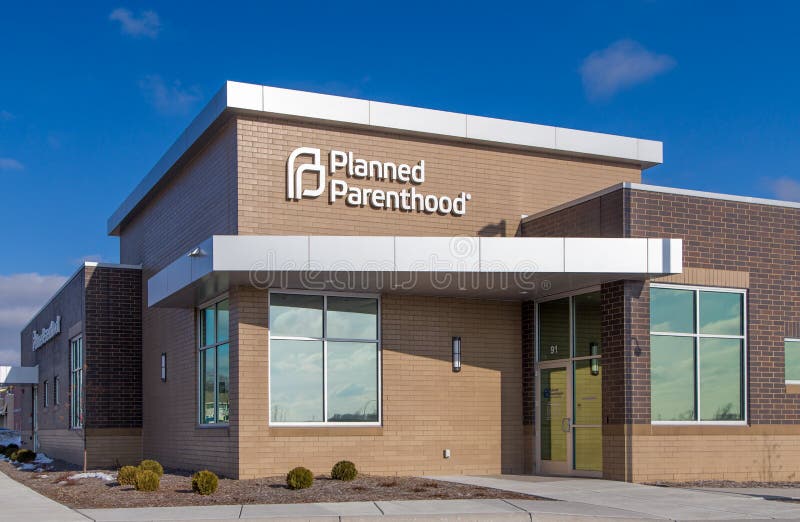 ST. PAUL, MN/USA - JANUARY 1, 2017: Planned Parenthood clinic exterior and logo. Planned Parenthood is a non-profit organization that provides reproductive health services. ST. PAUL, MN/USA - JANUARY 1, 2017: Planned Parenthood clinic exterior and logo. Planned Parenthood is a non-profit organization that provides reproductive health services.