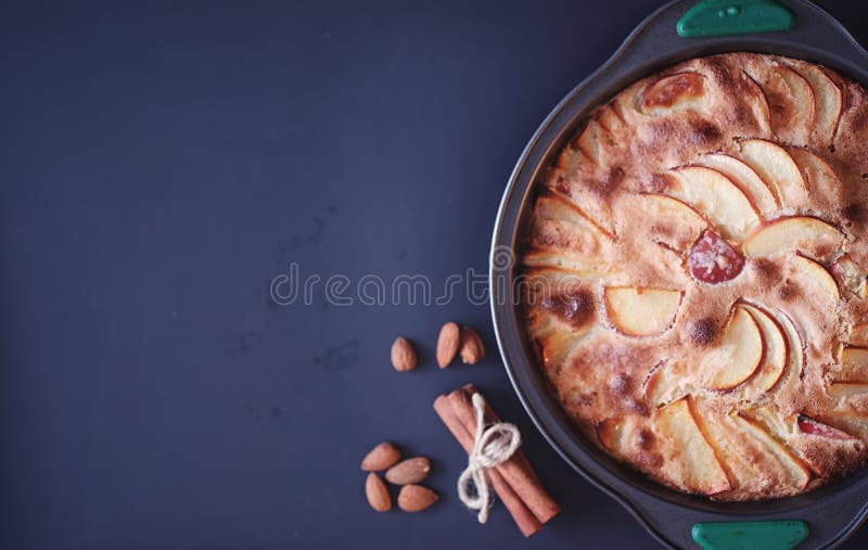 Preparation of apple pie at home. Homemade pastries with apples and nuts. Sweet dessert apples baked.r. Preparation of apple pie at home. Homemade pastries with apples and nuts. Sweet dessert apples baked.r