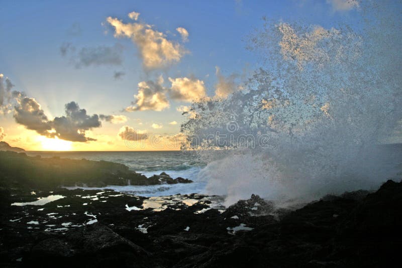 Sunrise on Poipu, Kauaii. Shot right before this crashing wave soaked me... refreshing!. Sunrise on Poipu, Kauaii. Shot right before this crashing wave soaked me... refreshing!