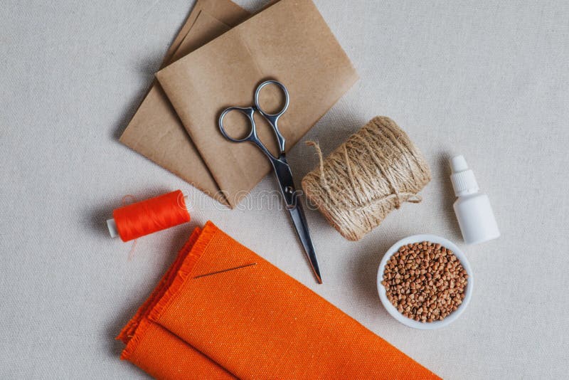 Step-by-step tutorial: decorative pumpkin made of orange dyed fabric for Halloween. Step 1. Required materials. Horizontal photo. Step-by-step tutorial: decorative pumpkin made of orange dyed fabric for Halloween. Step 1. Required materials. Horizontal photo.