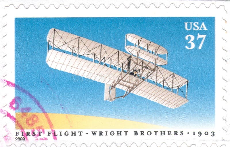 United States first class cancelled 37 cent postage stamp honoring first flight by the Wright Brothers. Stamp issued in 2003 to honor 100 years of flight 1903-2003. United States first class cancelled 37 cent postage stamp honoring first flight by the Wright Brothers. Stamp issued in 2003 to honor 100 years of flight 1903-2003