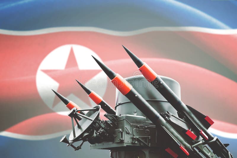 Picture of nuclear weapon for mass destruction with North Korea flag in the background. Picture of nuclear weapon for mass destruction with North Korea flag in the background
