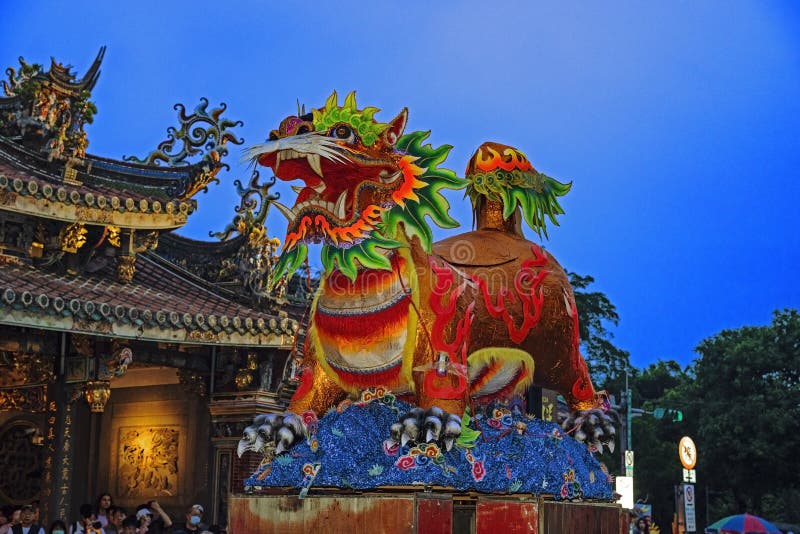 TAIPEI, TAIWAN - April 22,2024 :The Baoan Temple’s Fire Lion Fireworks Show (fang huoshi) is the combination of an impressive display of beehive firecrackers and traditional paper arts. TAIPEI, TAIWAN - April 22,2024 :The Baoan Temple’s Fire Lion Fireworks Show (fang huoshi) is the combination of an impressive display of beehive firecrackers and traditional paper arts.