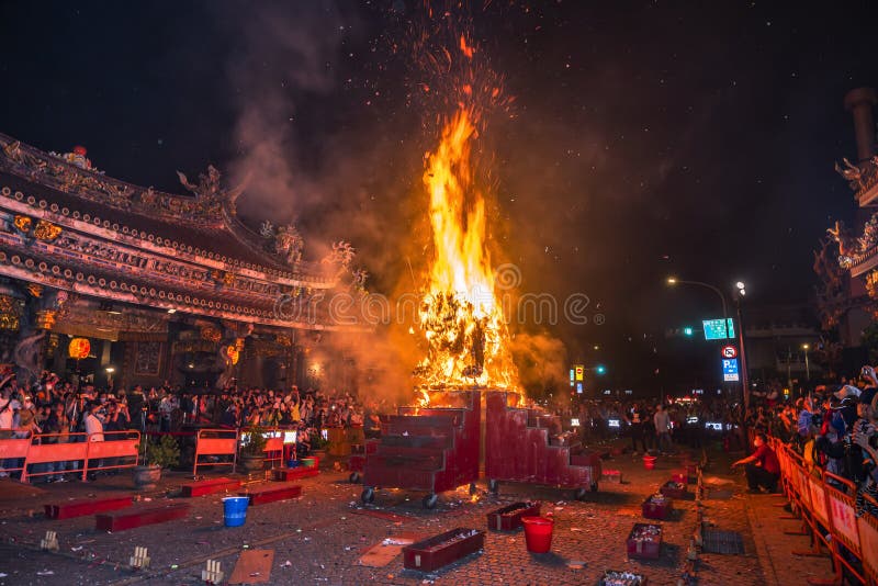 TAIPEI, TAIWAN - April 22,2024 :The Baoan Temple’s Fire Lion Fireworks Show (fang huoshi) is the combination of an impressive display of beehive firecrackers and traditional paper arts. TAIPEI, TAIWAN - April 22,2024 :The Baoan Temple’s Fire Lion Fireworks Show (fang huoshi) is the combination of an impressive display of beehive firecrackers and traditional paper arts.