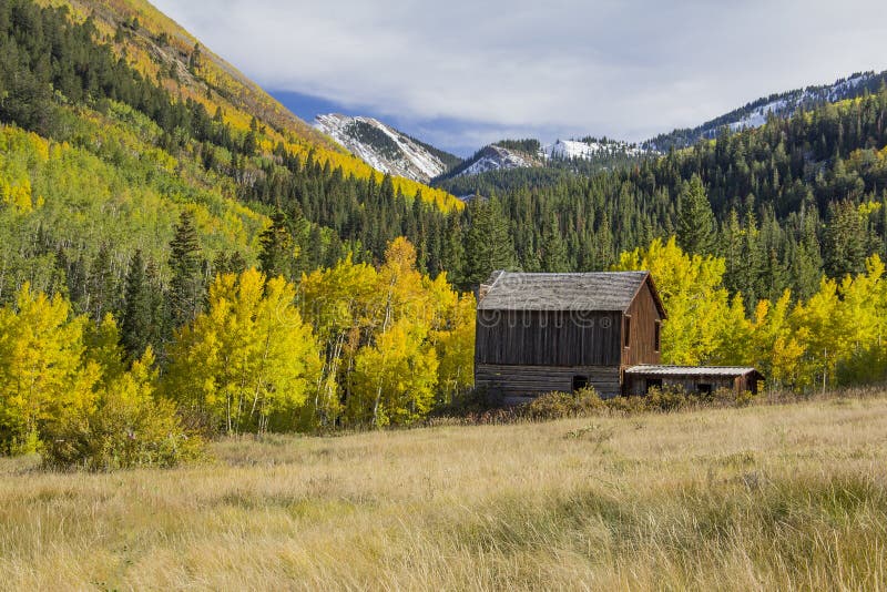 Ashcroft, Colorado, is an old gold mining ghost town that has been abandoned for over 100 years. This is a Fall or Autumn photograph. The Aspens are turning gold. The Colorado Rockies are in the background. Ashcroft, Colorado, is an old gold mining ghost town that has been abandoned for over 100 years. This is a Fall or Autumn photograph. The Aspens are turning gold. The Colorado Rockies are in the background.