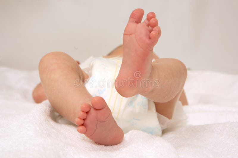 Small legs of the baby. Small legs of the baby