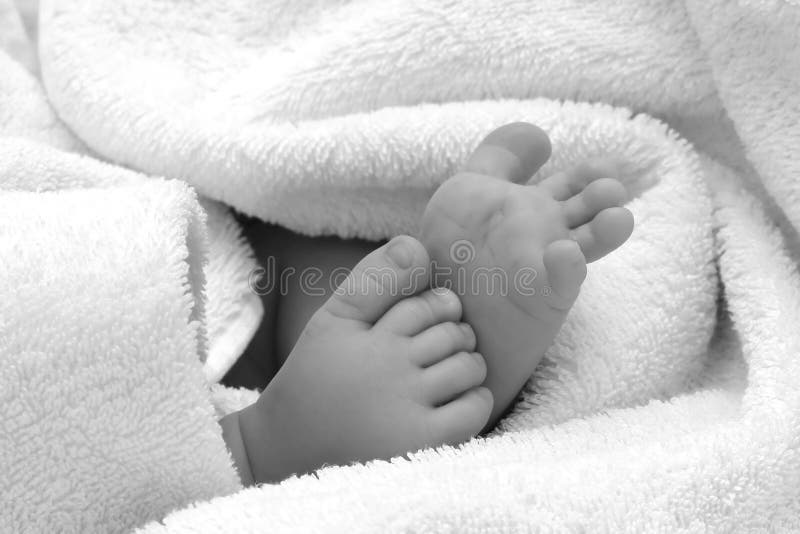 Black and white baby feet. Black and white baby feet