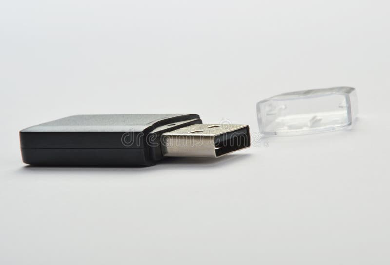 Ραβδί USB στο λευκό στοκ φωτογραφίες με δικαίωμα ελεύθερης χρήσης Ραβδί USB στο λευκό στοκ φωτογραφίες με δικαίωμα ελεύθερης χρήσης