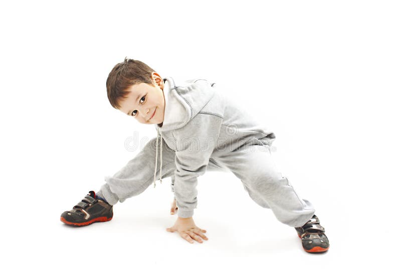 Little cool hip-hop boy in dance. Isolated on white background. Little cool hip-hop boy in dance. Isolated on white background