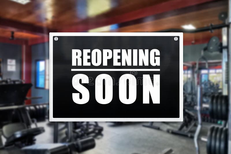 Reopening sign of a gym or fitness center. Concept of business recovery or lifting of restrictions. Reopening sign of a gym or fitness center. Concept of business recovery or lifting of restrictions.