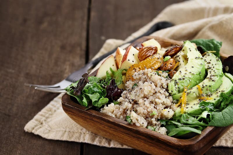 Quinoa, avocado and apple salad. Perfect for the detox diet or just a healthy meal. Selective focus with extreme shallow depth of field. Quinoa, avocado and apple salad. Perfect for the detox diet or just a healthy meal. Selective focus with extreme shallow depth of field.