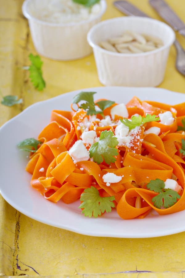 Carrot pasta salad with feta and almonds. Carrot pasta salad with feta and almonds