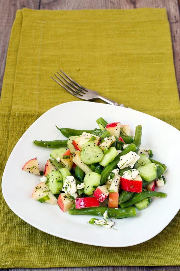 Green beans and apple salad with lemon poppy seed dressing. Green beans and apple salad with lemon poppy seed dressing