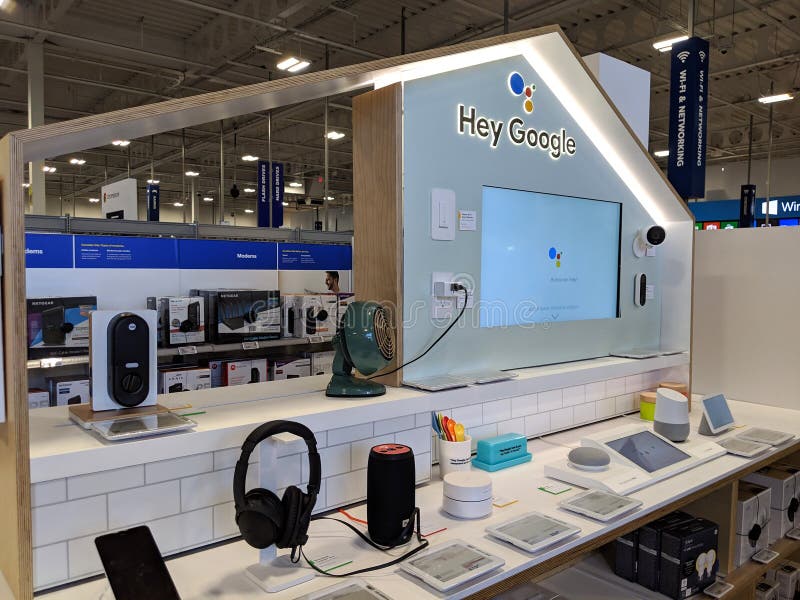 Honolulu -  March 16, 2019:  Hey Google Sign.  Close-up of Google Home, Mini, Max, other devices, and Logo on Display inside Best Buy Store.  Google LLC is an American multinational technology company that specializes in Internet-related services and products, which include online advertising technologies, search engine, cloud computing, software, and hardware, speaker, icon, web, symbol, business, plus, white, media, browser, page, connection, website, editorial, illustrative, logotype, paper, brand, design, modern, cut, communication, www, gmail, social, app, marketing, button, network, application, android, closeup. Honolulu -  March 16, 2019:  Hey Google Sign.  Close-up of Google Home, Mini, Max, other devices, and Logo on Display inside Best Buy Store.  Google LLC is an American multinational technology company that specializes in Internet-related services and products, which include online advertising technologies, search engine, cloud computing, software, and hardware, speaker, icon, web, symbol, business, plus, white, media, browser, page, connection, website, editorial, illustrative, logotype, paper, brand, design, modern, cut, communication, www, gmail, social, app, marketing, button, network, application, android, closeup