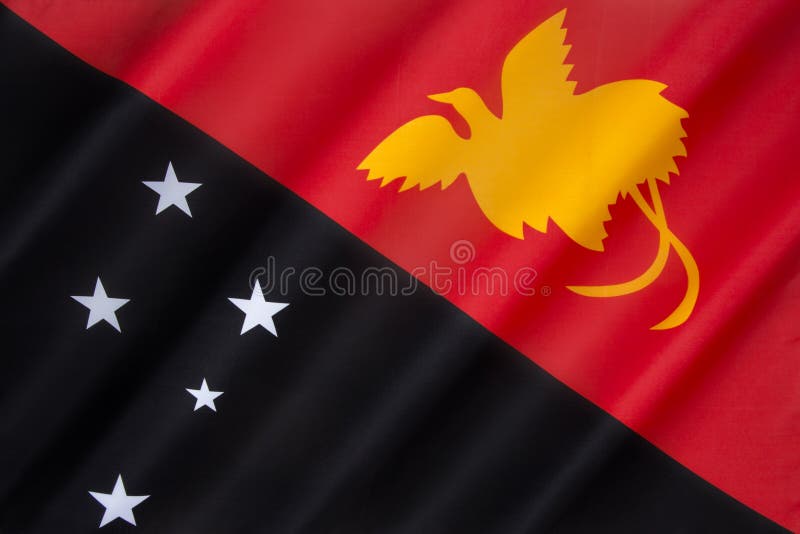 The flag of Papua New Guinea was adopted on July 1, 1971. It depicts the Southern Cross and a raggiana bird of paradise. The designer of the flag was 15-year-old schoolgirl, Susan Huhume, who won a nationwide competition for a new flag design. The flag of Papua New Guinea was adopted on July 1, 1971. It depicts the Southern Cross and a raggiana bird of paradise. The designer of the flag was 15-year-old schoolgirl, Susan Huhume, who won a nationwide competition for a new flag design.