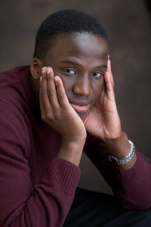 Portrait of a young black man thinking. Portrait of a young black man thinking