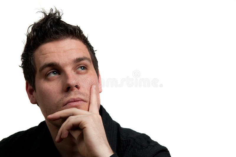 Portrait of a young man in black clothes looking up and thinking, isolated on white. Portrait of a young man in black clothes looking up and thinking, isolated on white