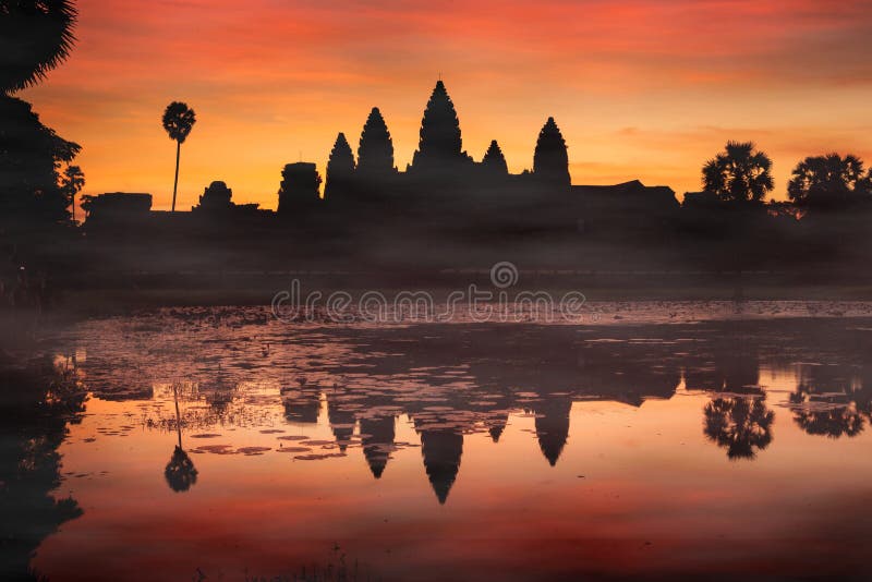 Silhouette of Angkor Wat at sunrise with the mist. Monument of Cambodia - Siem Reap. Silhouette of Angkor Wat at sunrise with the mist. Monument of Cambodia - Siem Reap