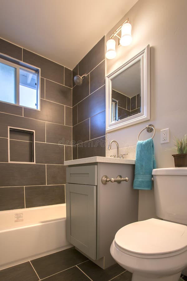 Model homes always show off beautiful bathrooms with clever design. Model homes always show off beautiful bathrooms with clever design