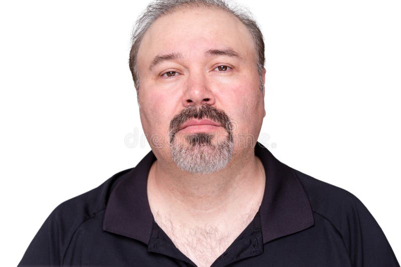 Sombre looking middle-aged man staring at the camera with a thoughtful expression, on white. Sombre looking middle-aged man staring at the camera with a thoughtful expression, on white