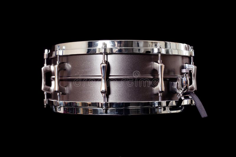 Snare on a black background, musical instrument, musical concept.Close up picture. Snare on a black background, musical instrument, musical concept.Close up picture