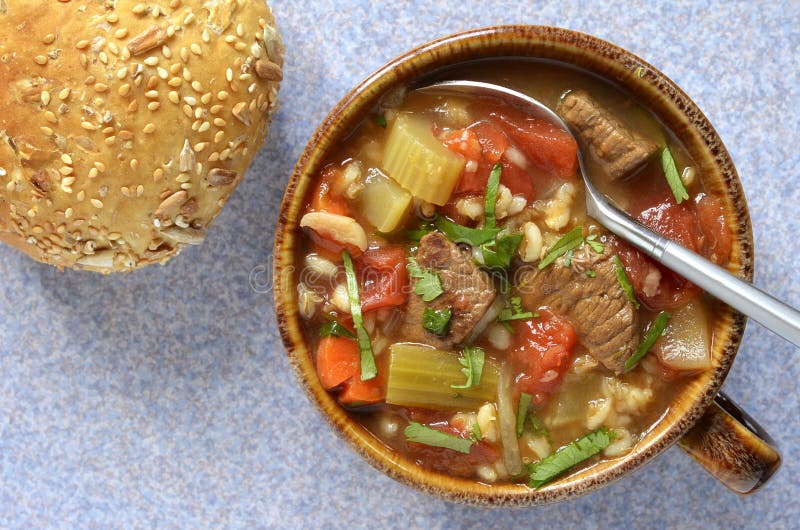 Hearty healthy beef and barley vegetable soup from overhead perspective. Hearty healthy beef and barley vegetable soup from overhead perspective