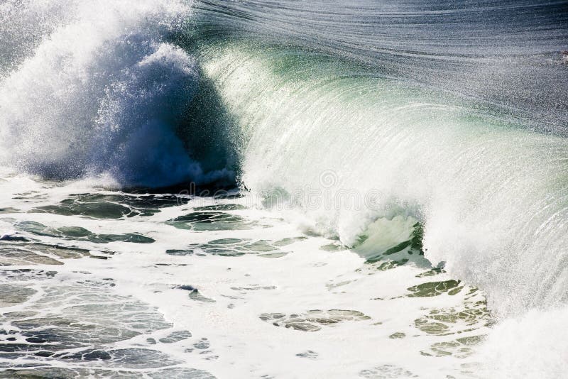 Crashing wave on the California coast between heats of a surf contest. Crashing wave on the California coast between heats of a surf contest.