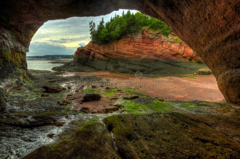 HDR image of caves and coastal features at low tide of the Bay of Fundy at St. Martins, New Brunswick, Canada. HDR image of caves and coastal features at low tide of the Bay of Fundy at St. Martins, New Brunswick, Canada.